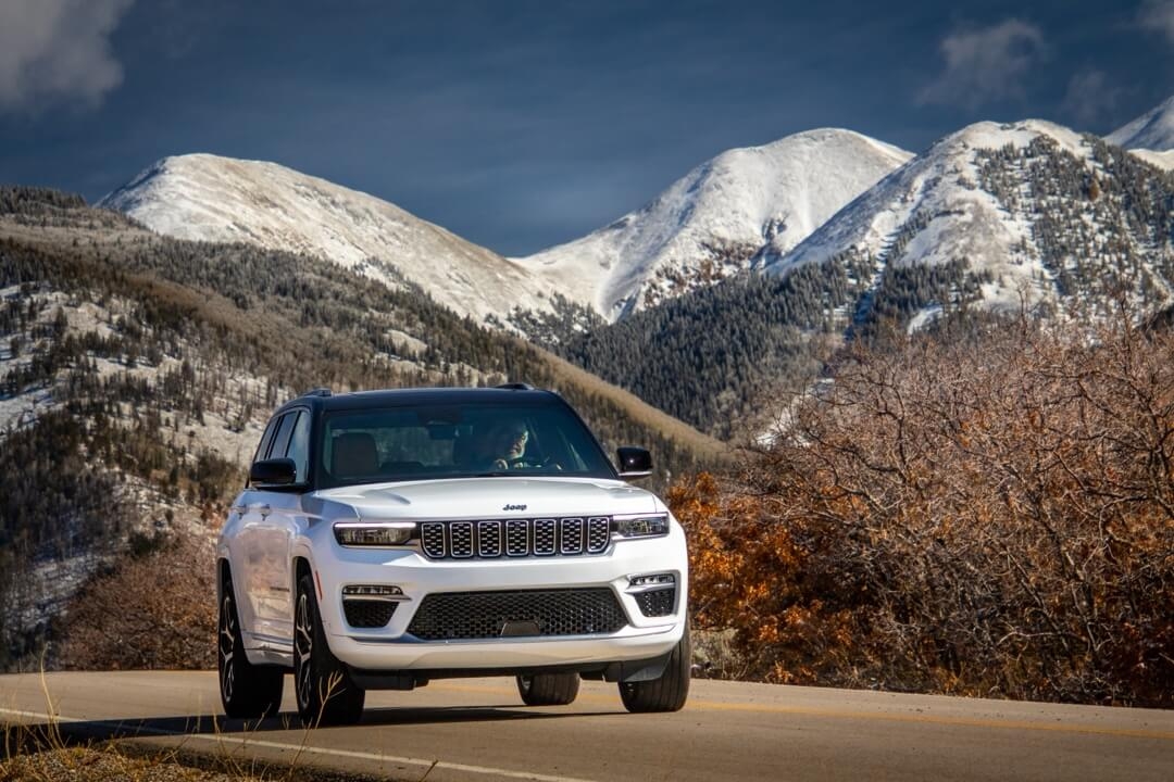The 2024 Jeep Grand Cherokee on the road.