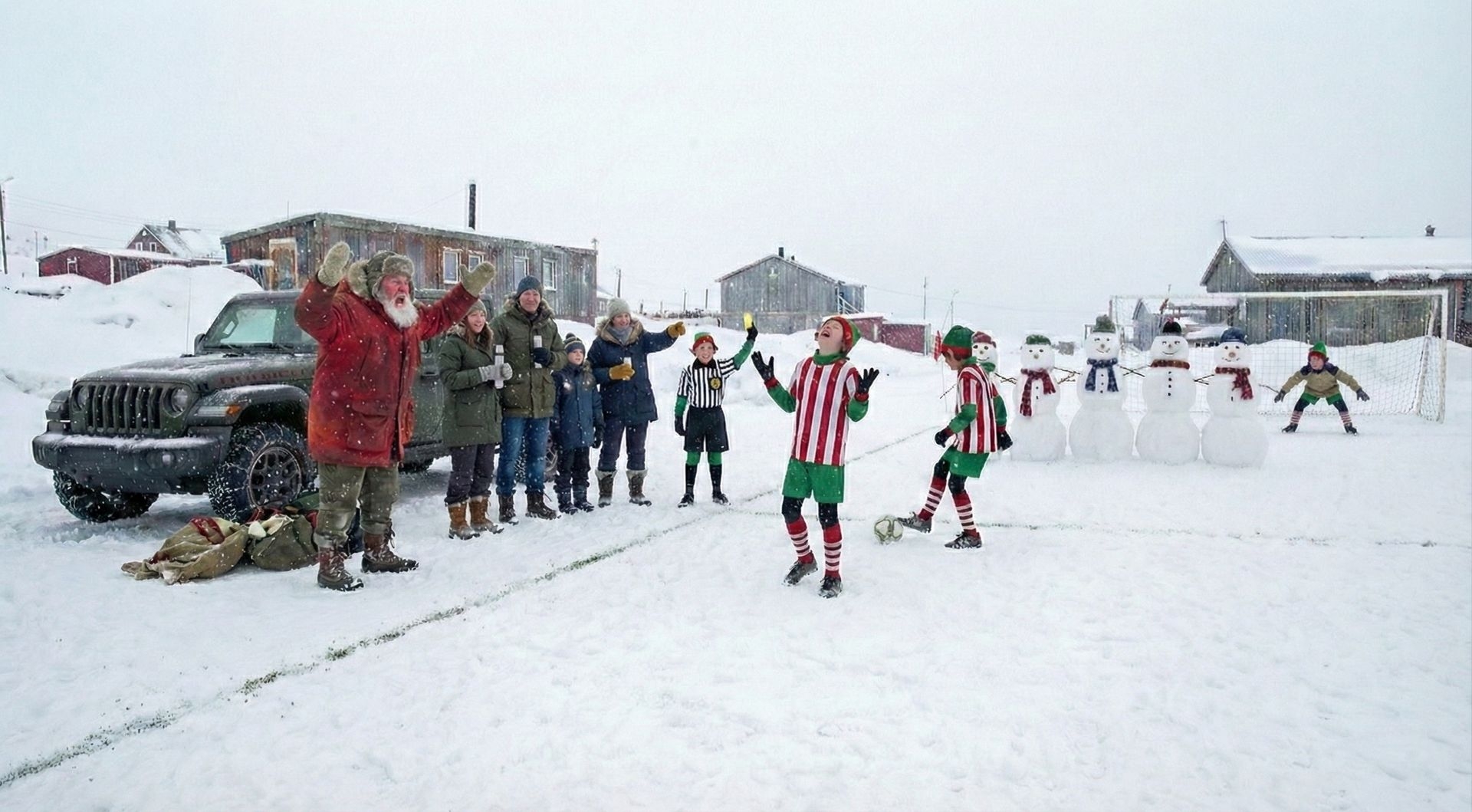 Père Noël coachant une équipe de lutins lors d’un match de snow soccer, avec un Jeep Gladiator stationné à côté du terrain enneigé